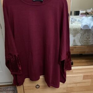 Embellished poncho type sweater